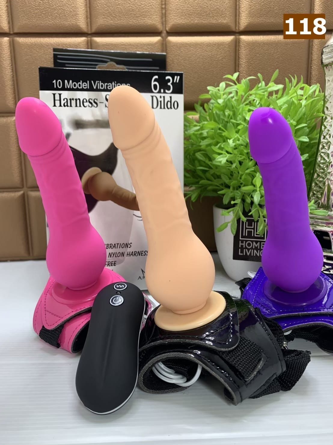 10 mode vibrating strap-on dildo with adjustable harness and wireless remote control.